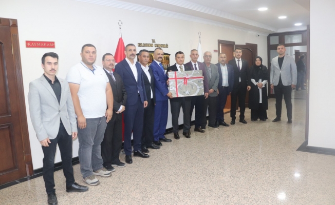 MHP İLÇE BAŞKANI VE YÖNETİMİNDEN KAYMAKAM'A ZİYARET