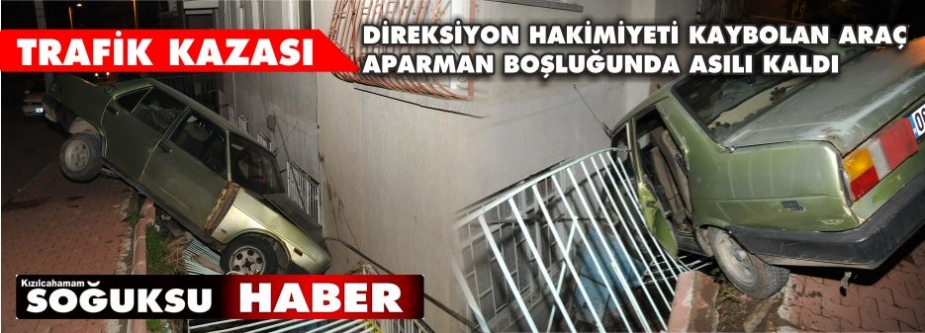 ARAÇ APARMAN BOŞLUĞUNDA ASILI KALDI